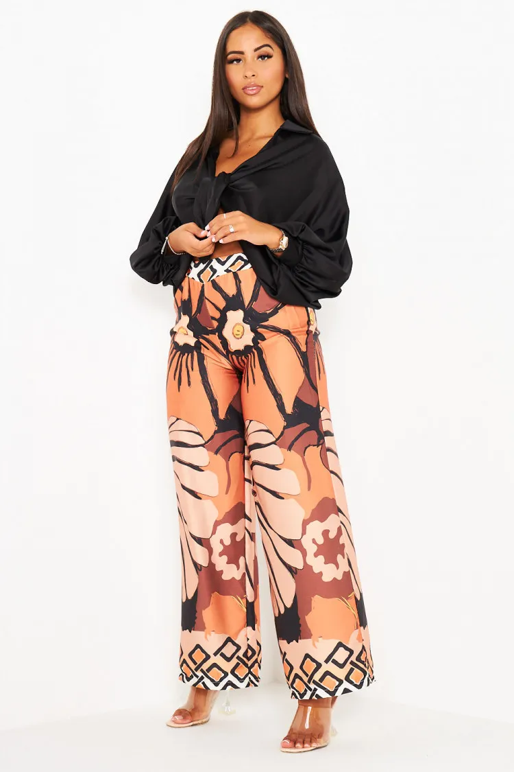 Ensemble 2 pièces chemise noir + pantalon orange à motif