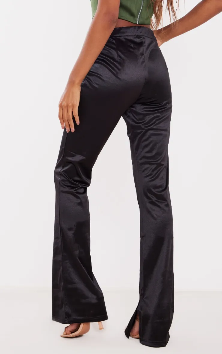 Pantalon flare satiné noir structuré à taille haute