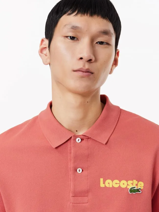 Polo uni logo rose orange homme - Lacoste | wimod